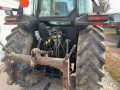 1999 Massey Ferguson 6280 4 WD w/ Loader MF1080 Loader 8’ wide Bucket and Pallet / Bale Forks, Loader Hydraulics Are Plumbed To Rear Remotes, Quick Attach, Serial # L142017, 122 Hp, Perkins Diesel Engine,Transmission 4 Gear Dyna Shift,Left Hand F/R,  Rear Tires are 18.4 R38 tires have cracks 40% Tread, Front Tires are 14.9 R28 tires have cracks 40% Tread, 4 Remotes, Quick Hitch, Cab in Fair Condition, Heat/AC, AM/FM Radio, 2274.5 verified Hours, Seat Fabric is Torn, Front Left Hood is Dented, Fuel Pump is Leaks Diesel Fuel when Running,