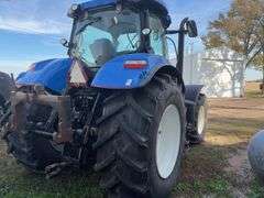 2013 New Holland T7.235 Tractor, Serial # 001146431,  234 hp, Rear Tires 710/70R 38 with Good Tread, Front Tires 600/65R28 with Good Tread, 70% Rubber, 540 & 1000 PTO, 964 verified Hours, Front Wheel Assist, Quick Hitch, Starts and Runs with No Issues, Clean Cab Interior, LH Shuttle Shift, Heat/AC, AM/FM Radio, Engine: Tier 4A/Stufe 3B Emission Level, 4 Remotes, Requires DEF,  Full Power Shift 18 Gear Transmission, (10) 100# Front Weights