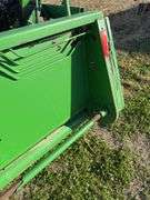 John Deere 925 Grain Head, Fits John Deere 9500 Combine, Fore/Aft Reel Cylinders, Has New Arm on Sickle Drive , Sickle Sections Good , Reel Has Composite Fingers, Stainless Pan, Poly Skids, Well Maintained Head, Header Cart IS NOT Included with Header.  See Lot #307A.