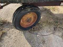 Hay Frame Wagon, 18’ Bed Length x 8’ Wide, Deck is Rotten, Steel Frame, Tongue has been extended, Tires are Dry Rotted, Steel Frame is rusted out by Back Axke,