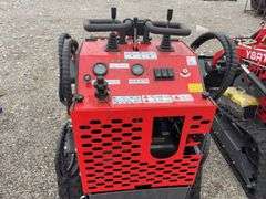 Unused AGT Stand On Skidsteer, Model YSRT14, Gas Engine, 31” Material Bucket, 420 CC (15hp) Engine. Headlights, Hydraulic Hookups on Boom, 6” wide Rubber Tracks,