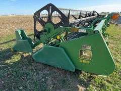 John Deere 925 Grain Head, Fits John Deere 9500 Combine, Fore/Aft Reel Cylinders, Has New Arm on Sickle Drive , Sickle Sections Good , Reel Has Composite Fingers, Stainless Pan, Poly Skids, Well Maintained Head, Header Cart IS NOT Included with Header.  See Lot #307A.