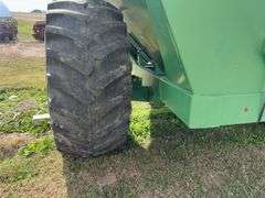 J & M 750 Grain Cart, 14” Discharge Auger, 1000 PTO, Rolling Tarp, No Scales, Tire Size 30.5L-32, Tires Hold Air