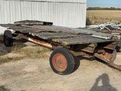 Hay Frame Wagon, 18’ Bed Length x 8’ Wide, Deck is Rotten, Steel Frame, Tongue has been extended, Tires are Dry Rotted, Steel Frame is rusted out by Back Axke,