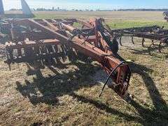 Sunflower Trash Mulcher/ Disc Chisel Plow, Model 1211-11, 11’ Wide, 19” Blades, Blades Are In Good/Fair Condition, Knives in Good Condition,  Uniroyal Tires 9.5L-15SL in Fair Condition (Cracks), Cylinders Rebuilt 2-3 Years Ago, Good Bearings