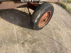 Hay Frame Wagon, 18’ Bed Length x 8’ Wide, Deck is Rotten, Steel Frame, Tongue has been extended, Tires are Dry Rotted, Steel Frame is rusted out by Back Axke,