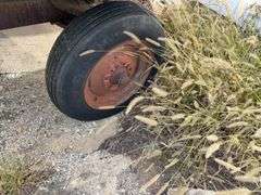 Hay Frame Wagon, 18’ Bed Length x 8’ Wide, Deck is Rotten, Steel Frame, Tongue has been extended, Tires are Dry Rotted, Steel Frame is rusted out by Back Axke,