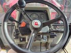 1999 Massey Ferguson 6280 4 WD w/ Loader MF1080 Loader 8’ wide Bucket and Pallet / Bale Forks, Loader Hydraulics Are Plumbed To Rear Remotes, Quick Attach, Serial # L142017, 122 Hp, Perkins Diesel Engine,Transmission 4 Gear Dyna Shift,Left Hand F/R,  Rear Tires are 18.4 R38 tires have cracks 40% Tread, Front Tires are 14.9 R28 tires have cracks 40% Tread, 4 Remotes, Quick Hitch, Cab in Fair Condition, Heat/AC, AM/FM Radio, 2274.5 verified Hours, Seat Fabric is Torn, Front Left Hood is Dented, Fuel Pump is Leaks Diesel Fuel when Running,