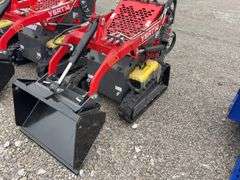 Unused AGT Stand On Skidsteer, Model YSRT14, Gas Engine, 31” Material Bucket, 420 CC (15hp) Engine. Headlights, Hydraulic Hookups on Boom, 6” wide Rubber Tracks,