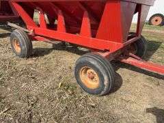 E-Z Trail Grain Wagon Model 3400, Hopper Door Does Operate, Tires Hold Air, 20% Tread Left, 300 Bushel, Rust on Front of Bed, Back of Bed has Dents,