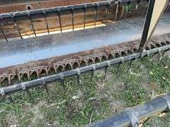 John Deere 925 Grain Head, Fits John Deere 9500 Combine, Fore/Aft Reel Cylinders, Has New Arm on Sickle Drive , Sickle Sections Good , Reel Has Composite Fingers, Stainless Pan, Poly Skids, Well Maintained Head, Header Cart IS NOT Included with Header.  See Lot #307A.