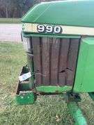 John Deere 990 Compact Tractor, Yanmar 40 HP 4 Cylinder Engine, ROPS,  14.9-24 Rear Tires 50% (Cracked), 6.00-16 Fronts 80%, Rear PTO, Category 1   3 Point Hitch, ROPS, Tachometer Works, Hour Meter Not Working, Fuel And Temp Gauges Working, 9 Forward Speeds, 3 Reverse Speeds, Strong Clutch , Brakes Work, Starts And Runs With No Know Issues, Power Steering 2 Wheel Drive