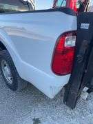 (TITLE) 2013 F-250 Super Duty XL Ford Pick Up, 2 WD, Matching Firestone 245/75R17 Tires (40%) AC Blows Cold,All Electronic Controls Work, Windows , Mirrors, Cruise Control, Etc. Vinyl Seats And Floor Mat,  No Tears, 8’ Bed,  Utility Rack, Working Tommy Gate, Reese Hitch W/ Trailer Electric Receptacle,  6.2 Liter V 8 Gas Engine,Fleet Maintained, Rust Free  W/ Minor Dings For A 12 Year Old Truck.