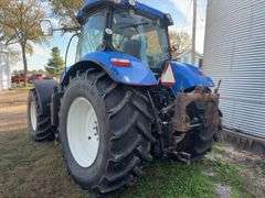 2013 New Holland T7.235 Tractor, Serial # 001146431,  234 hp, Rear Tires 710/70R 38 with Good Tread, Front Tires 600/65R28 with Good Tread, 70% Rubber, 540 & 1000 PTO, 964 verified Hours, Front Wheel Assist, Quick Hitch, Starts and Runs with No Issues, Clean Cab Interior, LH Shuttle Shift, Heat/AC, AM/FM Radio, Engine: Tier 4A/Stufe 3B Emission Level, 4 Remotes, Requires DEF,  Full Power Shift 18 Gear Transmission, (10) 100# Front Weights