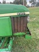 John Deere 990 Compact Tractor, Yanmar 40 HP 4 Cylinder Engine, ROPS,  14.9-24 Rear Tires 50% (Cracked), 6.00-16 Fronts 80%, Rear PTO, Category 1   3 Point Hitch, ROPS, Tachometer Works, Hour Meter Not Working, Fuel And Temp Gauges Working, 9 Forward Speeds, 3 Reverse Speeds, Strong Clutch , Brakes Work, Starts And Runs With No Know Issues, Power Steering 2 Wheel Drive