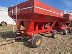 E-Z Trail Grain Wagon Model 3400, Hopper Door Does Operate, Tires Hold Air, 20% Tread Left, 300 Bushel, Rust on Front of Bed, Back of Bed has Dents,