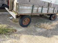 Hay Frame Wagon with SideBoards, 14’ Length x 6’-8” Wide, Spoke Rims, 3 Tires Hold Air, 1 Tire is Flat, Wagon bed has Sheet Metal on Floor, Hydraulic Dump w/ Cylinder,