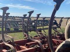 Kewanee Field Cultivator, 18’ Wide, Hydraulic Folding, Rolling Baskets in Back, Shovels Are Worn and Some Missing, 11L-15 SL Tires Fair Some Have Cracks, Hydraulic Lines Need Attention