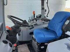 2013 New Holland T7.235 Tractor, Serial # 001146431,  234 hp, Rear Tires 710/70R 38 with Good Tread, Front Tires 600/65R28 with Good Tread, 70% Rubber, 540 & 1000 PTO, 964 verified Hours, Front Wheel Assist, Quick Hitch, Starts and Runs with No Issues, Clean Cab Interior, LH Shuttle Shift, Heat/AC, AM/FM Radio, Engine: Tier 4A/Stufe 3B Emission Level, 4 Remotes, Requires DEF,  Full Power Shift 18 Gear Transmission, (10) 100# Front Weights