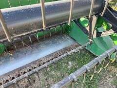 John Deere 925 Grain Head, Fits John Deere 9500 Combine, Fore/Aft Reel Cylinders, Has New Arm on Sickle Drive , Sickle Sections Good , Reel Has Composite Fingers, Stainless Pan, Poly Skids, Well Maintained Head, Header Cart IS NOT Included with Header.  See Lot #307A.