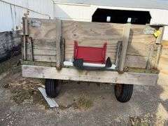 Hay Frame Wagon with SideBoards, 14’ Length x 6’-8” Wide, Spoke Rims, 3 Tires Hold Air, 1 Tire is Flat, Wagon bed has Sheet Metal on Floor, Hydraulic Dump w/ Cylinder,