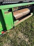 John Deere 925 Grain Head, Fits John Deere 9500 Combine, Fore/Aft Reel Cylinders, Has New Arm on Sickle Drive , Sickle Sections Good , Reel Has Composite Fingers, Stainless Pan, Poly Skids, Well Maintained Head, Header Cart IS NOT Included with Header.  See Lot #307A.