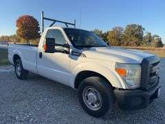 (TITLE) 2013 F-250 Super Duty XL Ford Pick Up, 2 WD, Matching Firestone 245/75R17 Tires (40%) AC Blows Cold,All Electronic Controls Work, Windows , Mirrors, Cruise Control, Etc. Vinyl Seats And Floor Mat,  No Tears, 8’ Bed,  Utility Rack, Working Tommy Gate, Reese Hitch W/ Trailer Electric Receptacle,  6.2 Liter V 8 Gas Engine,Fleet Maintained, Rust Free  W/ Minor Dings For A 12 Year Old Truck.