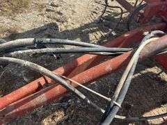 Kewanee Field Cultivator, 18’ Wide, Hydraulic Folding, Rolling Baskets in Back, Shovels Are Worn and Some Missing, 11L-15 SL Tires Fair Some Have Cracks, Hydraulic Lines Need Attention