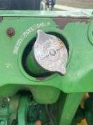 John Deere 990 Compact Tractor, Yanmar 40 HP 4 Cylinder Engine, ROPS,  14.9-24 Rear Tires 50% (Cracked), 6.00-16 Fronts 80%, Rear PTO, Category 1   3 Point Hitch, ROPS, Tachometer Works, Hour Meter Not Working, Fuel And Temp Gauges Working, 9 Forward Speeds, 3 Reverse Speeds, Strong Clutch , Brakes Work, Starts And Runs With No Know Issues, Power Steering 2 Wheel Drive