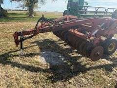 Sunflower Trash Mulcher/ Disc Chisel Plow, Model 1211-11, 11’ Wide, 19” Blades, Blades Are In Good/Fair Condition, Knives in Good Condition,  Uniroyal Tires 9.5L-15SL in Fair Condition (Cracks), Cylinders Rebuilt 2-3 Years Ago, Good Bearings