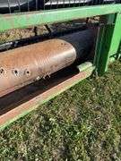 John Deere 925 Grain Head, Fits John Deere 9500 Combine, Fore/Aft Reel Cylinders, Has New Arm on Sickle Drive , Sickle Sections Good , Reel Has Composite Fingers, Stainless Pan, Poly Skids, Well Maintained Head, Header Cart IS NOT Included with Header.  See Lot #307A.