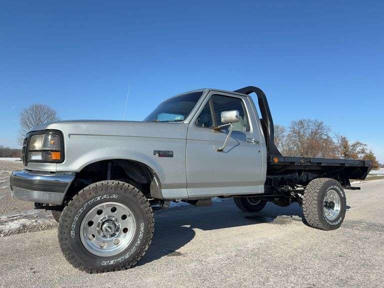 1997 F-250 Ford XL Pickup, 7.3 Diesel, 5 Speed Manual Transmission, 4 Wheel Drive,  New 235/70R17 Good Years All Around,Painted Hammered Metallic Gray,  Rust  On Passenger Side Door Sill, Passenger Door Hinges Need Adjustment, Painted Frame, Strong Clutch,  New Glow Plugs, Strong Battery, Aluminum Rims, 163,003 Miles On A Working Meter, Needs Work On Heat And Fuel Gauges, LED Lights, 5 th Wheel Ball Hitch, New Cadet Flat Bed, 102” Long, 80” Wide, Vinyl Floor Covering , 2 Fuel Tanks, Working Heater, AC Needs Charged, Dash And Seats Worn. Pretty Nice Looking Old School Diesel Flat Bed. Starts And Runs, Cold Natured but  Idles Good When Warmed Up.