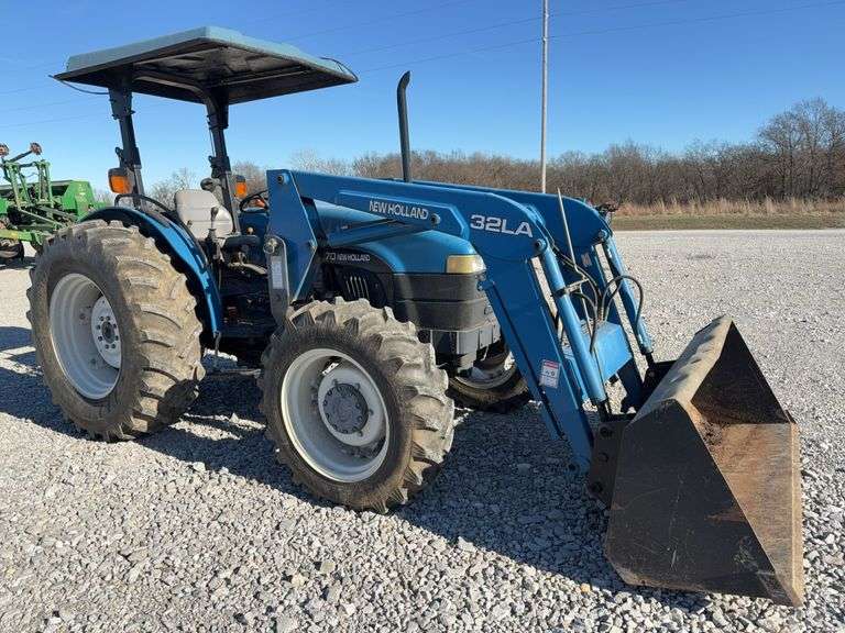 New Holland TN 70 Tractor, Front Wheel Assist, New Holland 32 LA Loader, Joy Stick Controller, 6’ Bucket (Nice), New Hydraulic Pump , 16.9 - 30 Rear Tires 80%, 11.2-24 Fronts (60%), (3) Rear Hydraulic  Remotes ,Synchro Command Transmission (Creeper Gear Option), ROPS / Sun Shade, 3 Point, Top Link, 540 PTO, Shedded And Regularly Serviced, Consigned By A Tree Farm Going Out Of Business