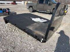 2020 Knapheide Flat Bed w/Linex Coating, Minor Damage Back Left Corner, 2 1/2” Reciever hitch, taillights, Stake Pockets, wiring harness for taillights, has a recessed 2 5/8 inch ball for a gooseneck trailers.