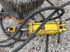 (2) Laminated Rotary Cutter Tires and Rims, 5 Bolt Rims, Tires Measure 20”, John Deere Hydraulic Cylinder, Measures 12”x4”x With Hoses