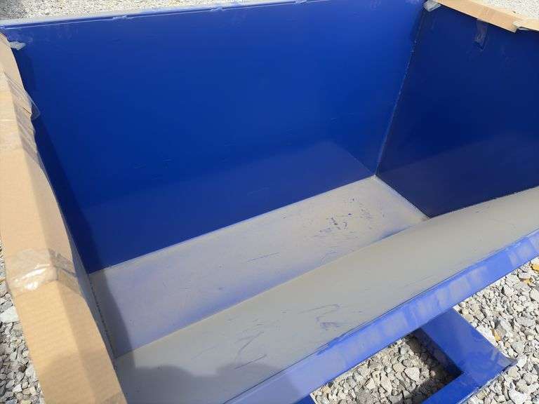 Unused Hanbase 1 1/2 CY  Dumping Hopper, 59 in Interior Width,
35.75 in Deep,
Pull the handle and it will dump, manual reset,