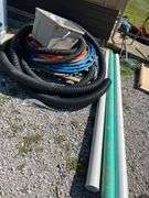 (3) 10’ Long 4” Sticks Of Drain Pipe 2-1/8” Thick and 1- Schedule 40, (2) Totes of Miscellaneous Joints and Elbows For 4” PVC Thin Wall and Schedule 40, Blue Red and Orange Pex Tubing, Partial Roll of 3” and 4” Drain Tile