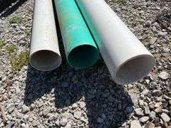 (3) 10’ Long 4” Sticks Of Drain Pipe 2-1/8” Thick and 1- Schedule 40, (2) Totes of Miscellaneous Joints and Elbows For 4” PVC Thin Wall and Schedule 40, Blue Red and Orange Pex Tubing, Partial Roll of 3” and 4” Drain Tile