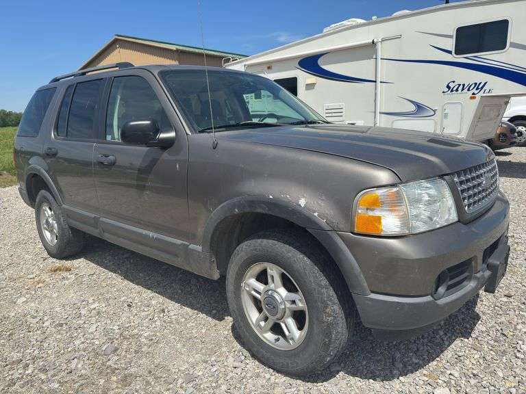 (TITLE) 2003 Ford Explorer XLT, 4 Wheel Drive (working), 99,002 Miles On A Working Odometer, Moon Roof, 235/70R16 Tires (30%), Power Locks, Windows, 4.0 L 6 Cylinder, Consignor Drove it For Work Vehicle. Braedon Roach 618 977-7078
