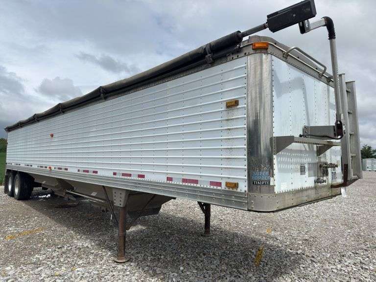 (TITLE) 2000 Timpte 41’ Hopper Bottom Trailer, High Reflective Rear Panel, Shurco Pro Trap Openers, Bridgestone 445/50R22.5 Super Singles 75% Deep Tread, Tires On Aluminum Rims, Air Ride Suspension, Frame Has Been Blasted And Repainted, 4500 Series ShurLok Power Tarp, Consignor Has Been Using It Regularly.Gary Miller 217 556-2763