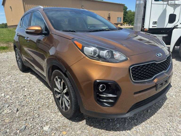 (TITLE) 2017 KIA Sportage EX, 4 Door Sport Utility, 159,154 Miles, 4 Cylinder 2.4 L, Sunroof, Sport Rack, Heated Leather Seats/Steering Wheel, Blind Spot Warning, Blue Tooth, Push Button Start, Back Up Camera, Remote Start, Power Seats, Navigation, Touch Screen Monitor, Was Driven By A Particular Women And Kept Clean And Serviced Regularly. Windshield Has A Crack, Low RPM It Hesitates But When It Reaches Higher RPM’S It Smooths Out And Shifts As It Should, Buy It That Way, Title In Hand