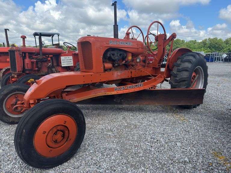 1950 W C Allis Chalmers Speed Patrol W/ Mid Mount Grader Blade, S/N 1E-3560, 4 Cylinder Gas Engine,Block Has A Repair On The Crack In The Block, Nice Repaint, Good Industrial Tires, Starts And Runs, 10’ Grader Blade, Selling For Jules McQuade Estate