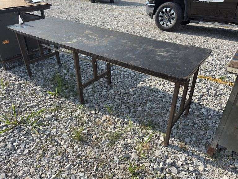 Workbench & work table, workbench measures 78” long x 25” wide x 36” high, Masonite top over 2x lumber, with some metal drawers, work table measures 8’ long X 30” wide X 31” high, Masonite top over 3/4” plywood, steel legs,