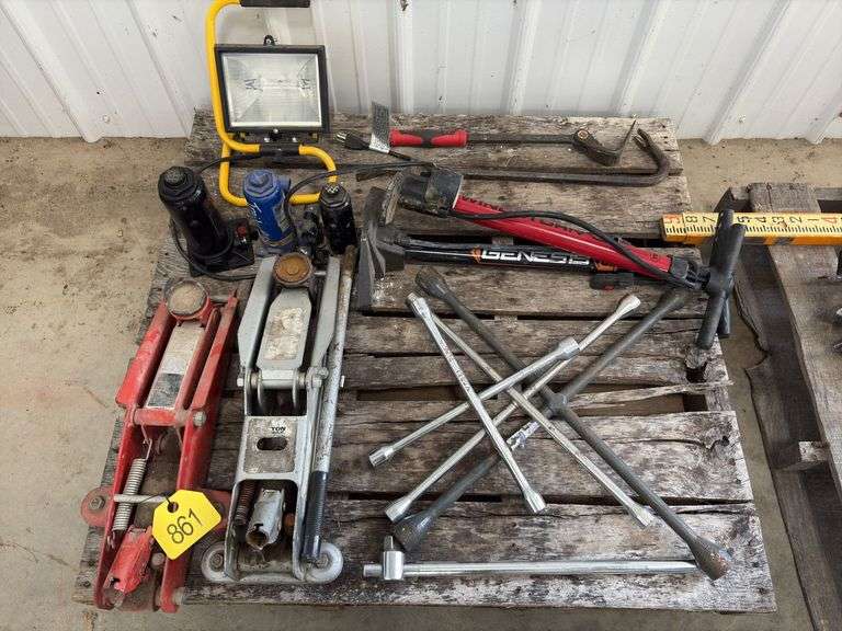 (2) Floor Jacks, 1 missing handle, (3) 4 way lug wrench standard and metric, (2) bicycle air pumps, (2) crow bars, (3) bottle jacks, flood light,