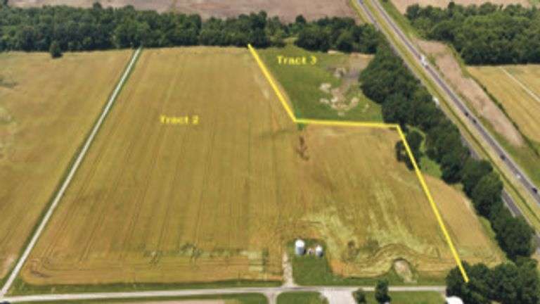 North of E 1625 Avenue/West of N 1125 Street including two older bins) 20.50 +/- Acres Tillable with wooded acres.  23.24 +/- Acres total, Rural Water Runs Along Frontage