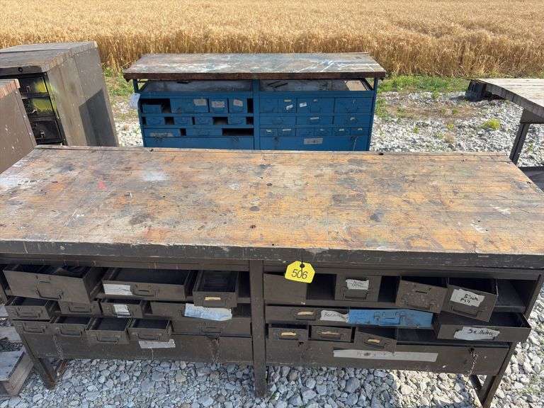 (2) Workbenches w/ 2x wood tops, measure 6’ long X 25 1/2” wide X 36” tall, sliding steel drawers, cabinet is made of steel,