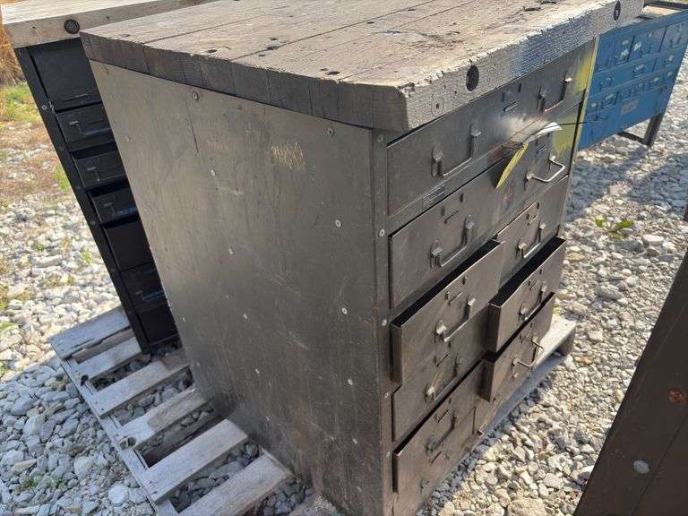 (2) Small Workbenchs, One measures 25” wide X 27” deep X 35 1/2” tall, other one measures 25” wide X 20” deep X 35 1/2” tall, 2x lumber tops, metal drawers in both cabinets, steel framing,