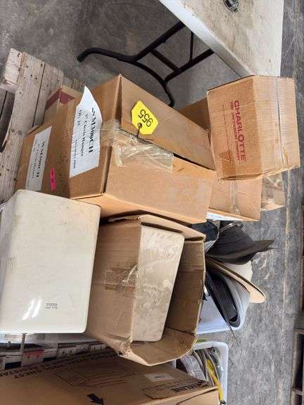 (4)Boxes of 3” Clevis Hangers approx 25 in a box, (2) Boxes of 1 1/2” Clevis Hangers approx 100 in a box, plastic tote of rubber witches hats pipe flashing for roof, plastic tote of a toilet tank,  slip joint connectors