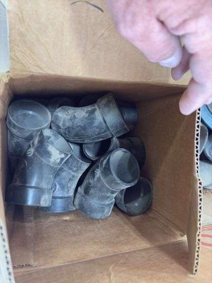 Pallet of various ABS Fittings, plastic tote of gas line, flexible stranded water supply line, Hilti Epoxy Caulk gun,