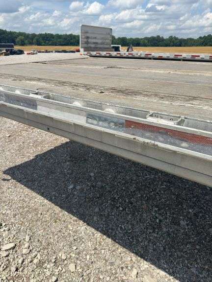 (TITLE) 2005 Ravens 48’ Aluminum Flat Semi Trailer, 22.5’S On Aluminum Outer Rims, 10’ Spread Axel, Aluminum Frame, Brakes In Good Shape (70%), Professional Weld Repair (Pictured), No Cracks On Frame, Air Ride Suspension, 102” Wide, Title In Hand,  5 th Wheel Pin Looks Good,Selling To Dissolve A Trucking Company Partnership.